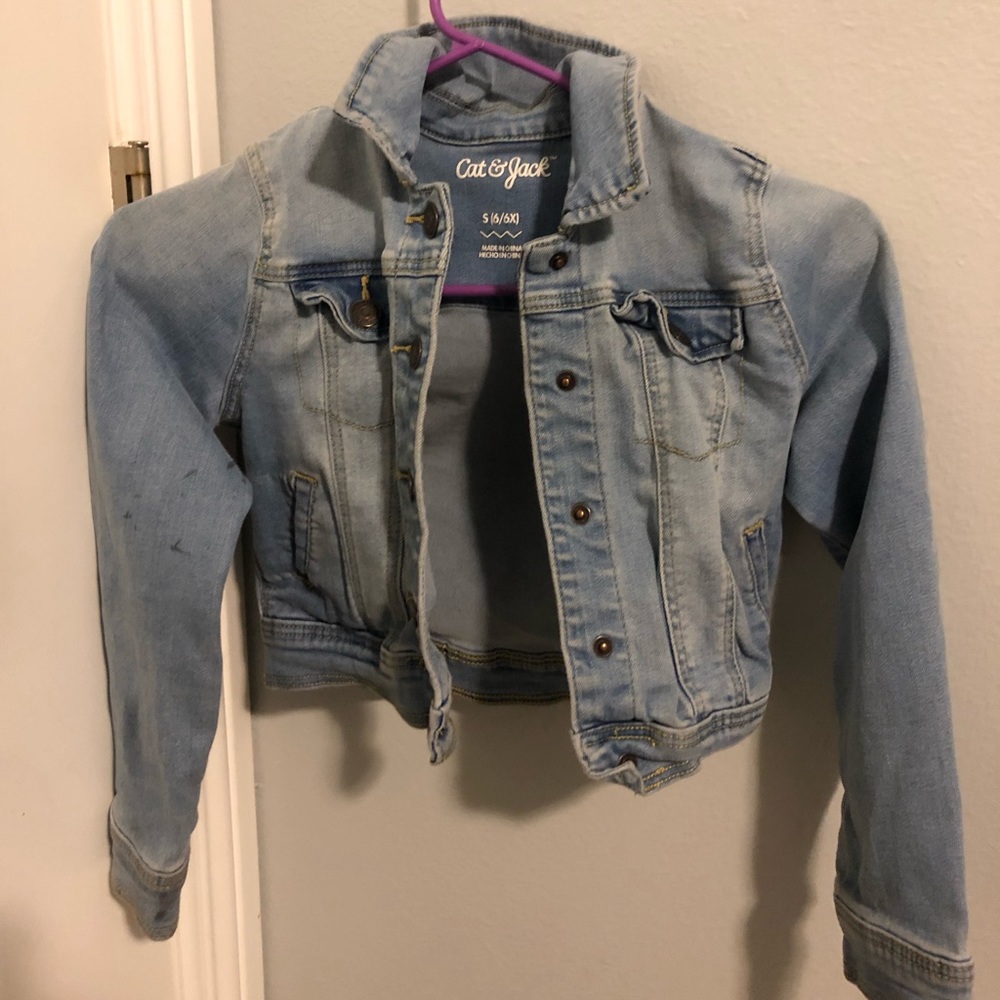 girl’s blue jacket